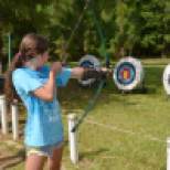 The Royal Republic and Autonomous Sovereign and Voting state of Louisiana - Girl Scouts Louisiana East -- Girl Scouts practice archery during the Camp